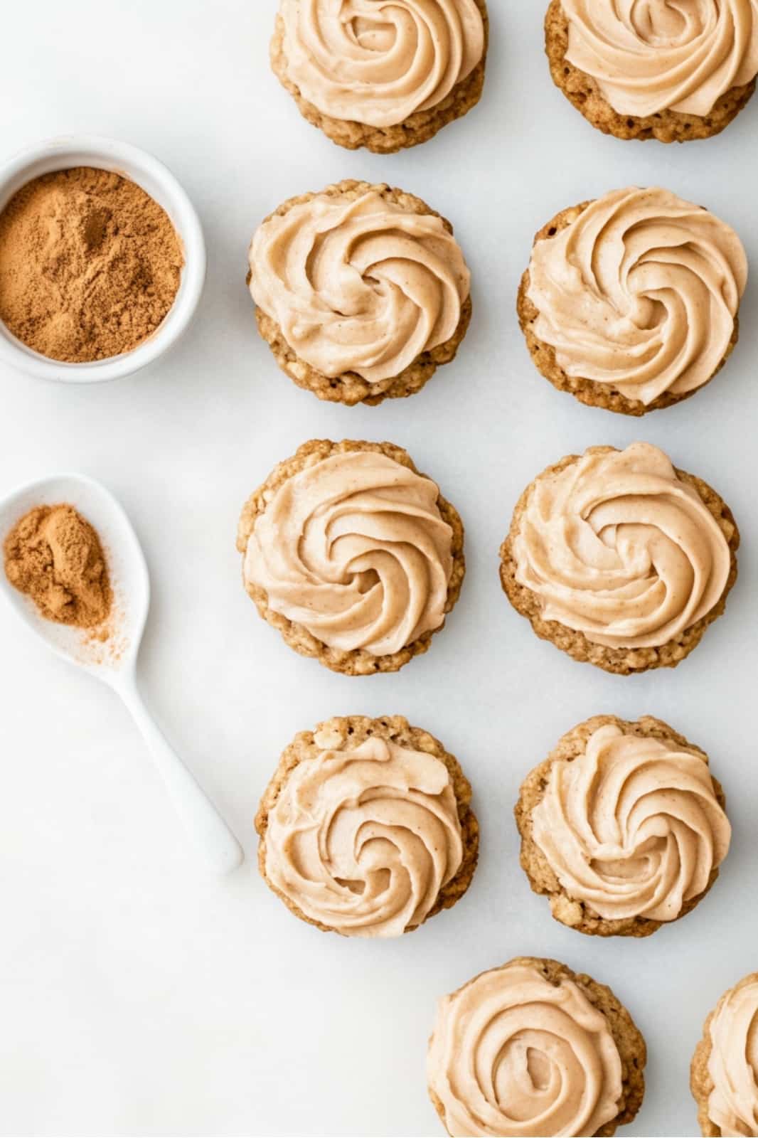 These Pumpkin Oatmeal Cookies with Cinnamon Cream Cheese Frosting are the perfect fall treat! Soft and spiced with pumpkin and oats, topped with a rich cinnamon frosting.