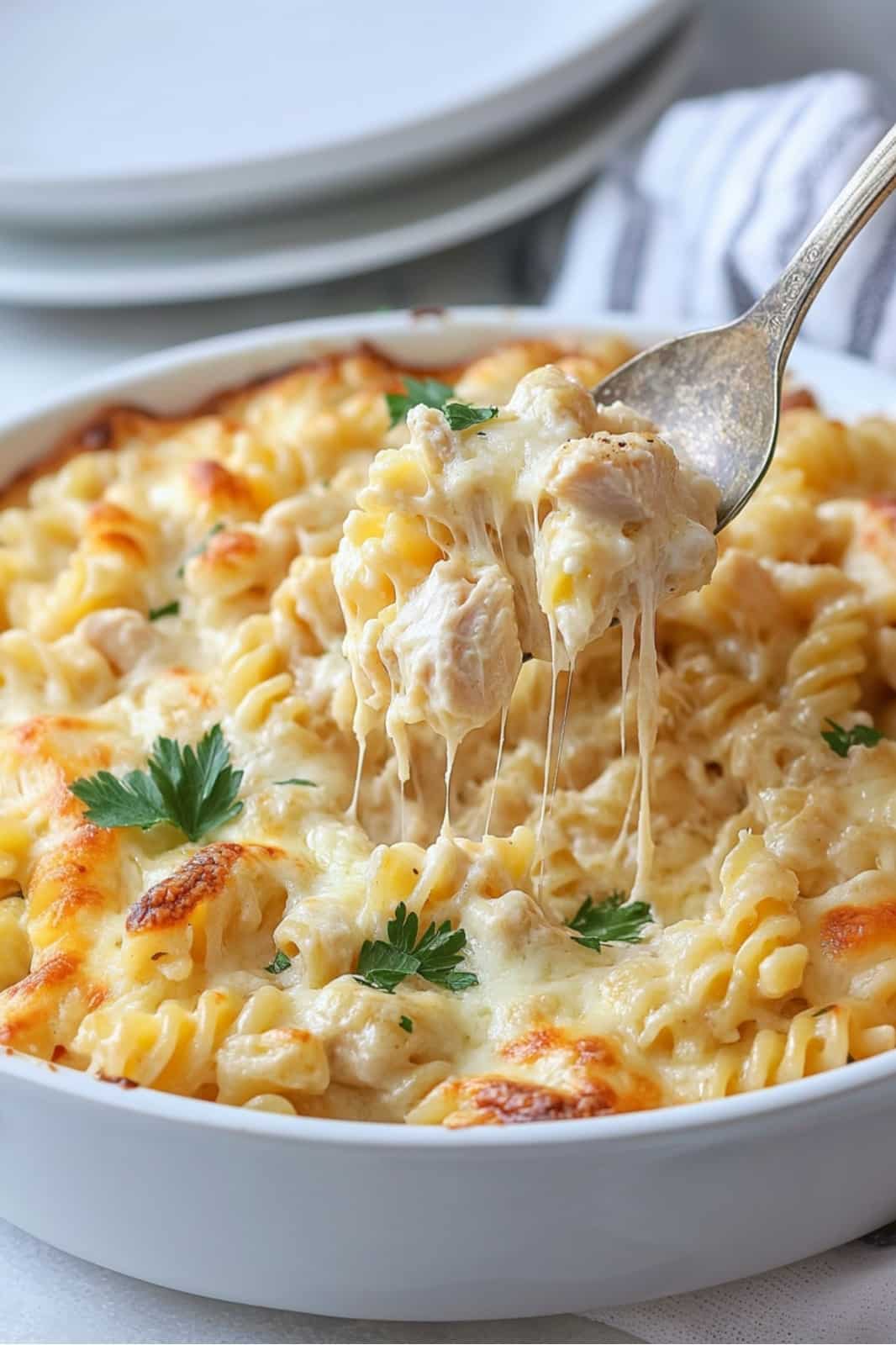 This Garlic Parmesan Chicken Pasta Bake is creamy, cheesy, and perfect for a cozy dinner! Made with rotini pasta, tender chicken, Alfredo sauce, and mozzarella, it’s a delicious one-dish meal ready in 45 minutes.