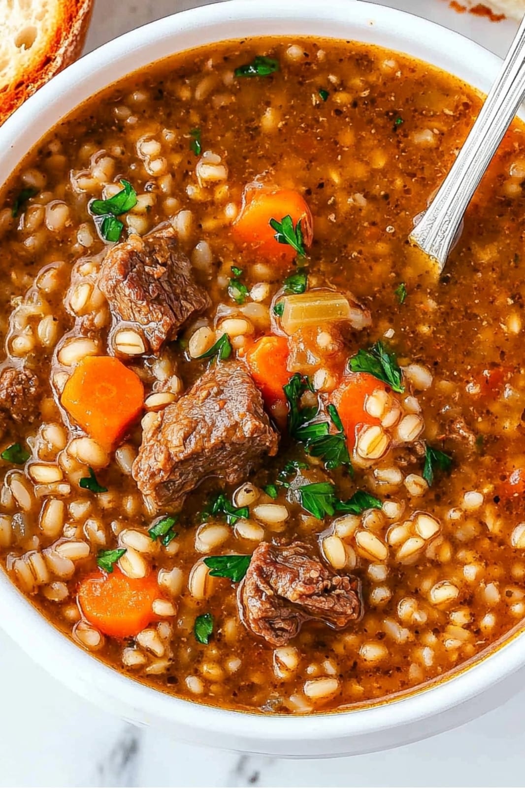 This Easy Beef Barley Soup recipe is hearty and comforting! Made with tender beef, vegetables, and barley in a rich broth, it’s perfect for a cozy meal. Ready in just over an hour!