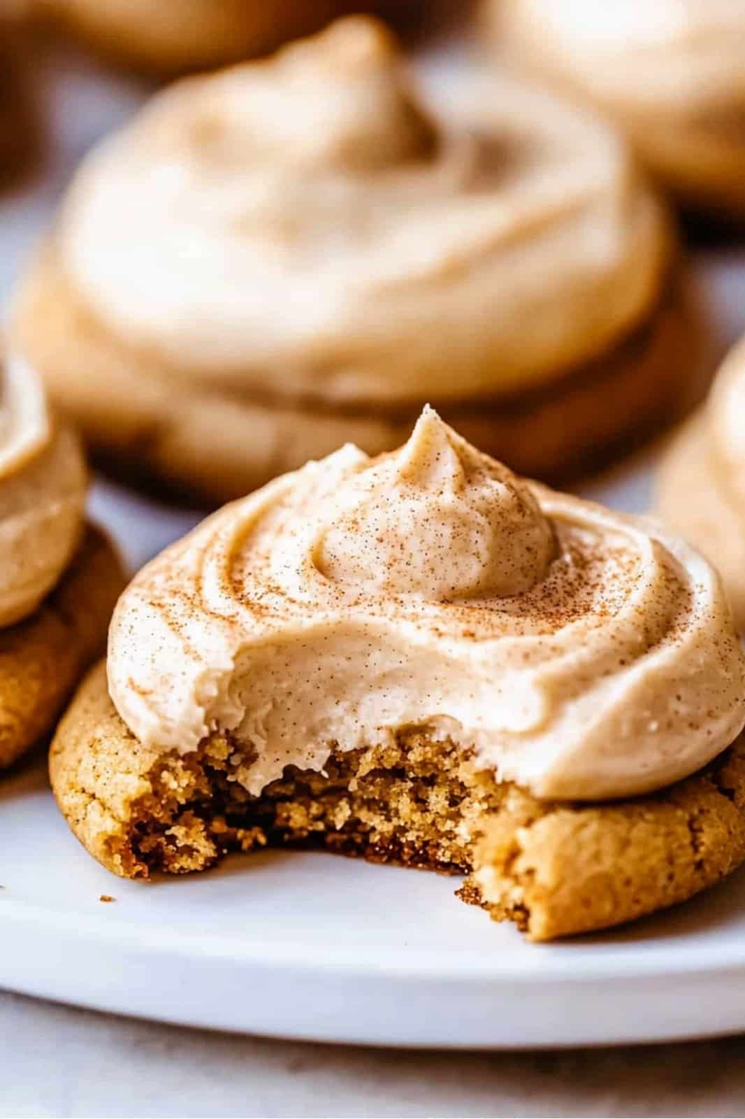 These Pumpkin Cookies with Cinnamon Cream Cheese Frosting are a fall favorite! Soft, spiced pumpkin cookies topped with creamy cinnamon frosting for a perfect autumn treat.