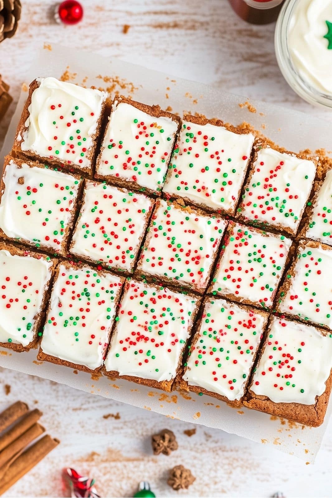 These Chewy Gingerbread Bars Recipe topped with cream cheese frosting are the perfect holiday treat! Full of warm spices like cinnamon, ginger, and cloves, these easy-to-make bars are a festive delight for any Christmas gathering. Ready in just over an hour!