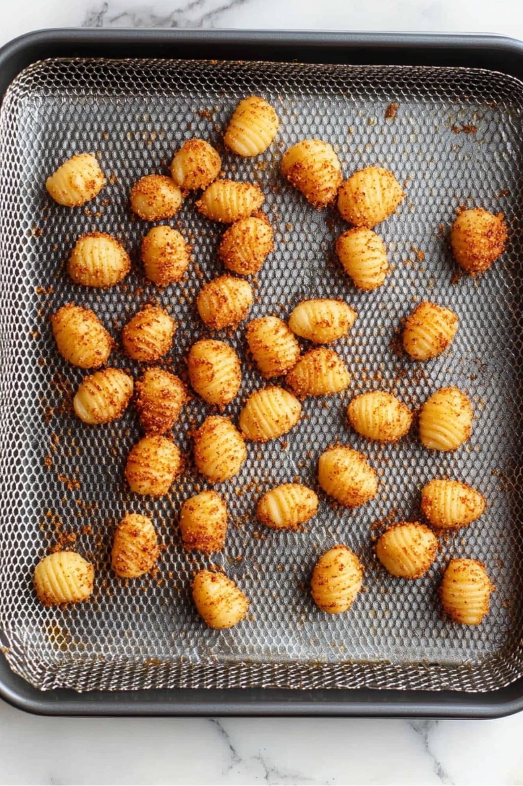 This Crispiest Air Fryer Gnocchi recipe makes perfectly golden gnocchi in just 15 minutes! Enjoy as a side, appetizer, or salad topping for a quick, deliciously crispy treat.