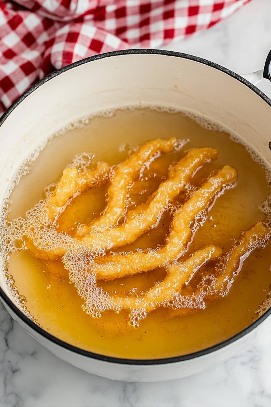 These Crispy Funnel Cake Sticks are a fun, easy-to-make treat! Golden and dusted with powdered sugar, they’re perfect for a quick dessert or snack and ready in just 15 minutes.