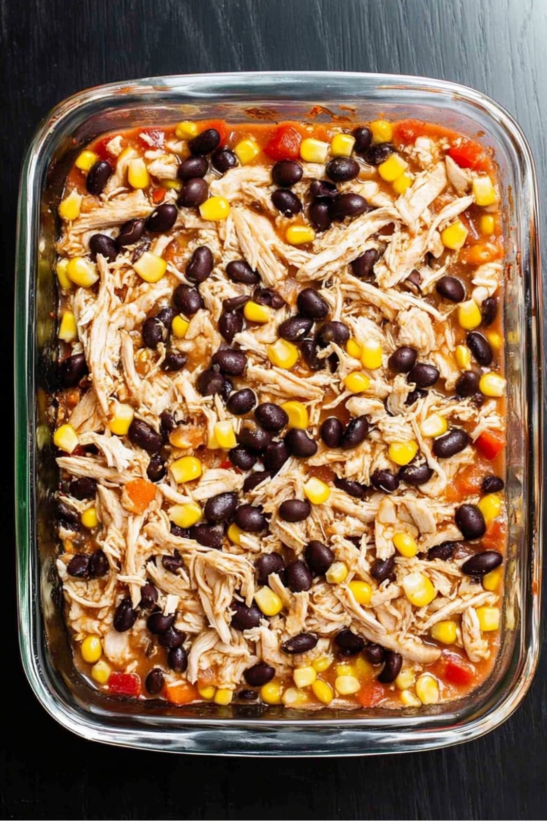 This Easy Chicken Burrito Casserole is a one-pan meal packed with chicken, rice, beans, and cheese for a deliciously hearty dinner! Perfect for weeknights and ready in just 90 minutes.