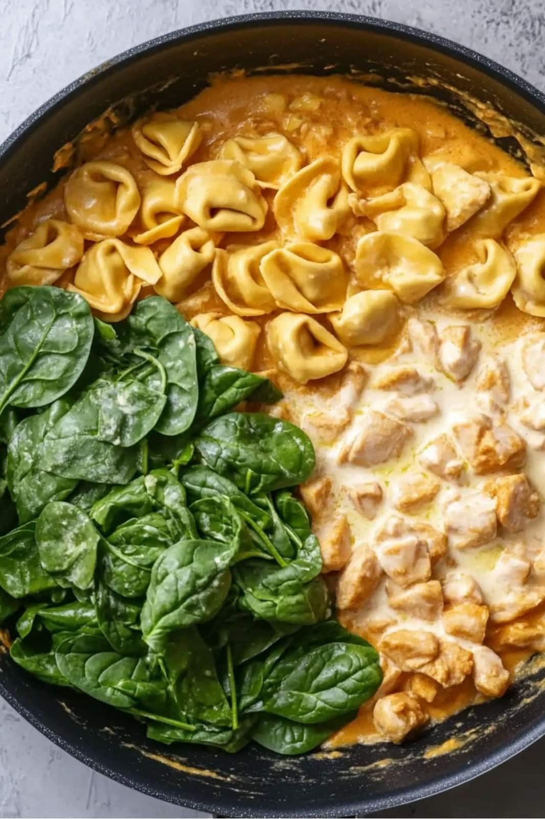 This Marry Me Chicken Tortellini recipe combines tender chicken, cheese tortellini, and a creamy sun-dried tomato sauce for a deliciously comforting meal! Ready in 30 minutes, perfect for weeknights.