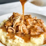 Savory Smothered Chicken with Cheesy Mashed Potatoes Recipe