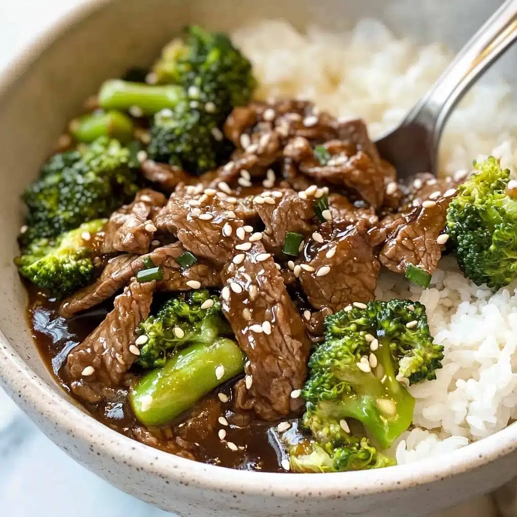 Chinese Beef and Broccoli, Chinese beef and broccoli recipe, quick Chinese beef stir-fry, easy beef and broccoli dinner, Asian beef and broccoli A close-up shot of a white bowl filled with three layers of food: the bottom layer is fluffy white rice with a moist texture, the middle layer has chunks of green broccoli scattered throughout, and the top layer features thin slices of brown beef coated in a glossy sauce, sprinkled with white sesame seeds; a silver spoon rests in the rice, and everything sits on a white marbled texture background,