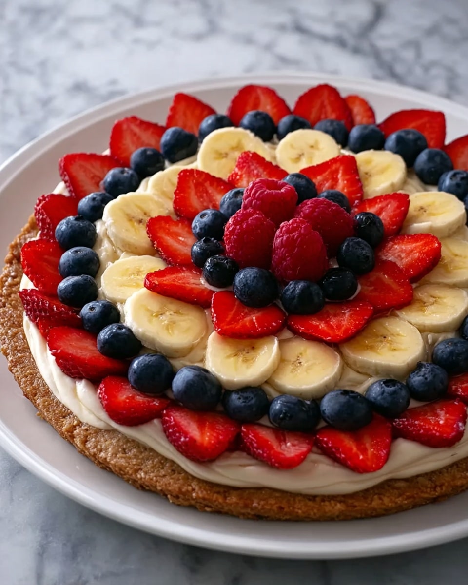 Oat & Yogurt Fruit Pizza Recipe 6 The image shows a close-up of a slice of fruit-topped dessert being lifted from a white plate. The dessert has three layers: the bottom layer is a thick, brown, soft-looking base with a crumbly texture; the middle layer is a creamy white spread evenly on top; and the top layer is made of fresh fruit, including sliced strawberries that are bright red, banana slices that are pale yellow, deep red raspberries, and dark blue blueberries scattered across the surface. The white plate full of the dessert sits on a background with a white marbled texture. A black-handled spatula holds the slice in the foreground. Photo taken with an iphone --ar 4:5 --v 7