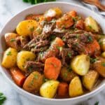 Slow Cooker Pot Roast with Vegetables and Herb Gravy Recipe