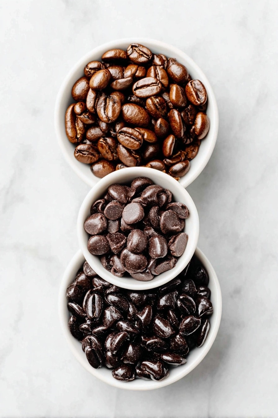 Flat lay of a small heap of glossy dark espresso beans, a small white ceramic bowl filled with rich semi-sweet chocolate chips, placed on a clean white marble surface, soft natural light, photo taken with an iPhone, professional food photography style, fresh ingredients, white ceramic bowls, no bottles, no duplicates, no utensils, no packaging --ar 2:3 --v 7 --p m7354615311229779997 - Chocolate Covered Espresso Beans, espresso bean confection, coffee chocolate snacks, caffeinated treat recipe, homemade espresso candies