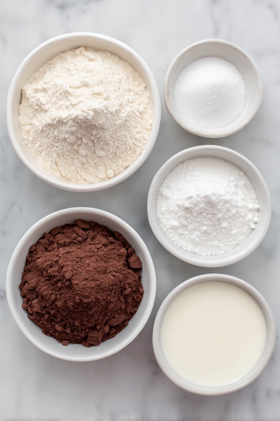 Flat lay of a small pile of chopped bittersweet and unsweetened chocolate pieces, a dollop of fluffy white marshmallow creme on a white ceramic plate, a small white bowl filled with rich dark espresso powder, a small white bowl of smooth golden melted unsalted butter, a small white bowl of thick pale sweetened condensed milk, a small white bowl of creamy white whipping cream, a whole uncracked brown egg, and a tiny white dish holding clear vanilla extract placed perfectly symmetrical and balanced on a clean white marble surface, soft natural light, photo taken with an iPhone, professional food photography style, fresh ingredients, white ceramic bowls, no bottles, no duplicates, no utensils, no packaging --ar 2:3 --v 7 --p m7354615311229779997 - Mocha Chocolate Fudge, mocha chocolate fudge recipe, mocha fudge, coffee chocolate fudge, easy chocolate fudge