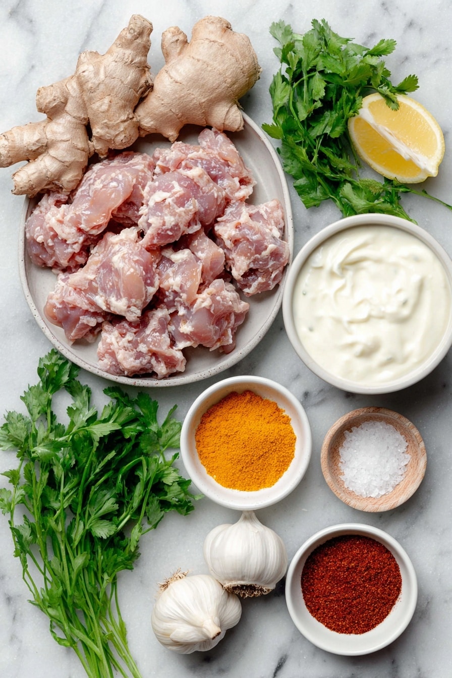 Easy Chicken Tikka Kebab Recipe 7 Flat lay of a cluster of fresh raw chicken breast pieces, a thumb-sized fresh ginger root with textured light brown skin, three clean whole garlic bulbs with white papery skins, a small mound of bright green fresh coriander leaves with stems, a simple white ceramic bowl filled with creamy white yogurt, another small white ceramic bowl holding vibrant orange-red Kashmiri chili powder, a white ceramic bowl containing golden cooking oil, a small white bowl with bright yellow turmeric powder, a white bowl with reddish-brown garam masala powder, a tiny white bowl with ground cumin powder in light brown shade, a wedge of fresh lemon with bright yellow peel cut to show juicy interior, a small white bowl with fine white salt crystals, all ingredients naturally fresh and unprocessed, perfectly arranged in symmetrical balance on a clean white marble surface, soft natural light, photo taken with an iPhone, professional food photography style, fresh ingredients, white ceramic bowls, no bottles, no duplicates, no utensils, no packaging --ar 2:3 --v 7 --p m7354615311229779997 - Easy Chicken Tikka Kebab, Chicken Tikka Kebabs, Indian Chicken Kebabs, Grilled Chicken Tikka, Juicy Chicken Kebabs