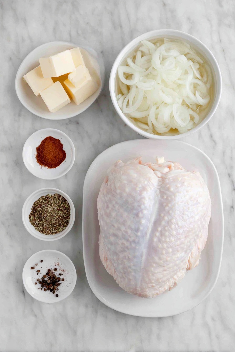 Slow Cooker Turkey Breast Recipe 7 Flat lay of a whole boneless turkey breast with natural skin, a small pile of garlic powder and smoked paprika powders side by side, a small mound of mixed poultry seasoning herbs, a pinch of coarse salt and black peppercorns scattered neatly, a simple white ceramic bowl filled with thinly sliced fresh onions, another white ceramic bowl containing clear chicken broth, and a few small cubes of unsalted butter arranged in a triangle on a white ceramic plate, all placed on a clean white marble surface, soft natural light, photo taken with an iPhone, professional food photography style, fresh ingredients, white ceramic bowls, no bottles, no duplicates, no utensils, no packaging --ar 2:3 --v 7 --p m7354615311229779997 - Slow Cooker Turkey Breast, Turkey Breast Recipe, Juicy Turkey Breast, Easy Holiday Turkey, Tender Slow Cooker Turkey