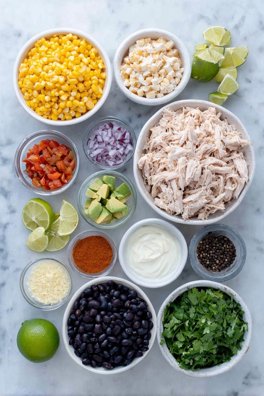 Southwest Chicken Salad Recipe 7 Flat lay of shredded rotisserie chicken, bright yellow fresh corn kernels, glossy black beans, finely diced red bell pepper, finely diced red onion, chopped fresh cilantro, a small diced avocado, a halved lime with visible juice, small white bowls of creamy mayonnaise, vibrant red hot sauce, ground cumin powder, smoked paprika powder, salt crystals, black peppercorns placed on a clean white marble surface, soft natural light, photo taken with an iPhone, professional food photography style, fresh ingredients, white ceramic bowls, no bottles, no duplicates, no utensils, no packaging --ar 2:3 --v 7 --p m7354615311229779997 - Southwest Chicken Salad, Southwest Chicken Salad recipe, easy chicken salad, healthy lunch ideas, quick dinner recipes