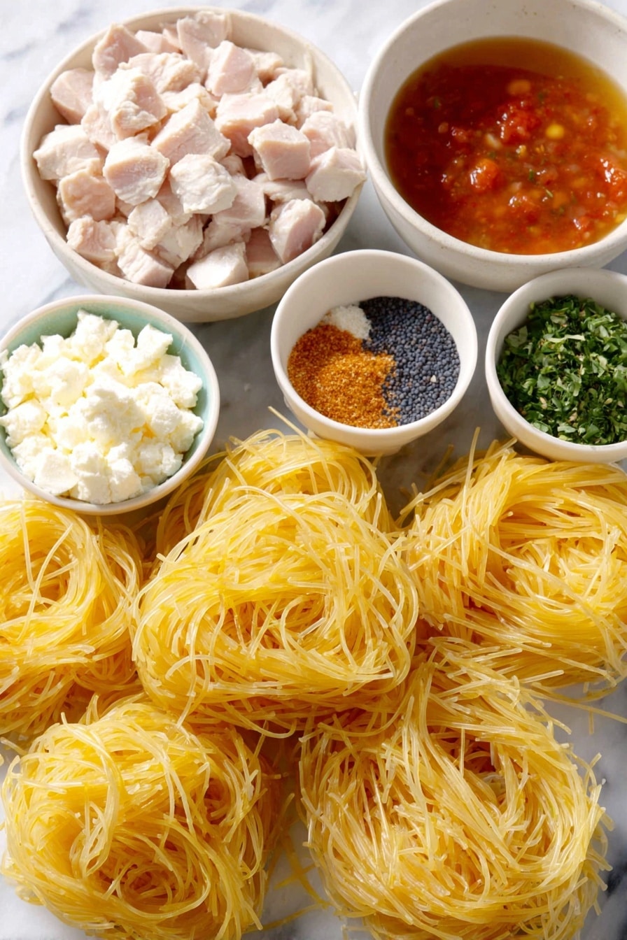 Creamy Chicken Spaghetti Bake Recipe 7 Flat lay of fresh angel hair pasta nests, a small white bowl of cubed cooked chicken, a small white bowl of creamy Mexican crema, a small white bowl of vibrant red salsa, a small white bowl of golden chicken broth, a small white bowl filled with a Mexican cheese blend, a small white bowl with taco seasoning powder, a small white bowl of finely chopped fresh parsley, and a small white bowl of freshly ground black peppercorns, all arranged symmetrically on simple white ceramic bowls and placed on a clean white marble surface, soft natural light, photo taken with an iPhone, professional food photography style, fresh ingredients, white ceramic bowls, no bottles, no duplicates, no utensils, no packaging --ar 2:3 --v 7 --p m7354615311229779997 - Creamy Chicken Spaghetti Bake, cheesy pasta casserole, easy chicken pasta dish, comforting chicken bake recipe, weeknight dinner idea