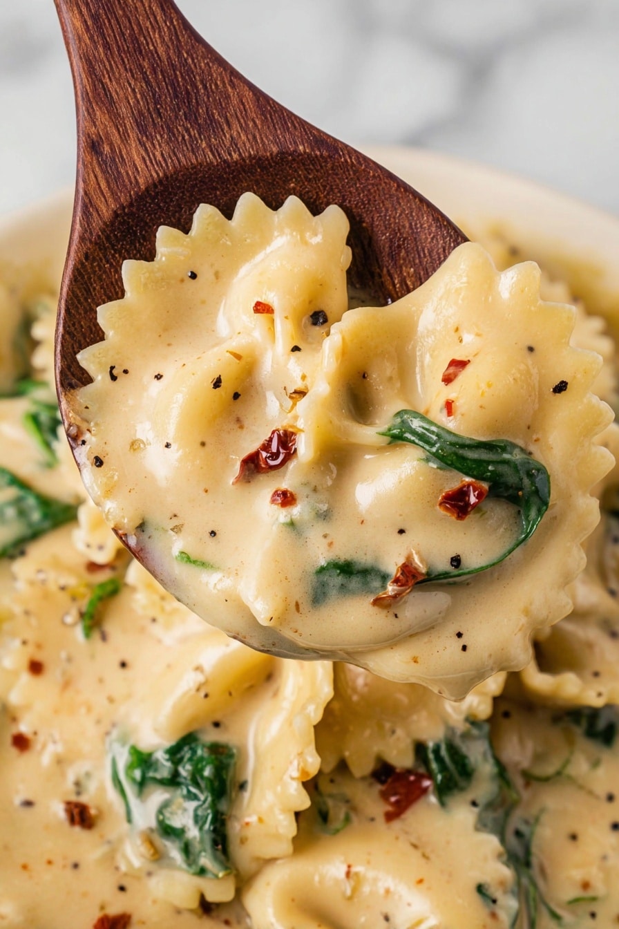The image shows a white bowl filled with creamy pasta soup placed on a white plate, sitting on a wooden surface. The soup has three main layers: a thick cream base with a pale yellow color with red and green bits, soft pasta pieces with wavy edges floating within, and whole spinach leaves adding bright green contrast. The top layer is sprinkled with grated cheese and fresh green parsley leaves. Around the bowl, there are loose pasta pieces, a sprig of parsley, and golden cutlery on a black and white checkered cloth. The background is a white marbled textured surface. Photo taken with an iphone --ar 2:3 --v 7 - White Lasagna Soup in Slow Cooker, creamy lasagna soup, easy slow cooker soup recipes, comforting lasagna-inspired soup, cozy soup for busy nights