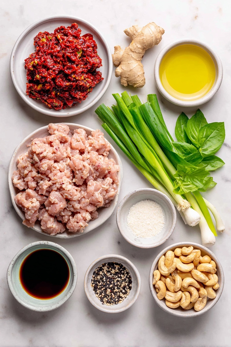 Gochujang Chicken Bowls Recipe 7 Flat lay of a small mound of gochujang paste with its deep red color, a few whole garlic cloves, peeled and minced fresh ginger root pieces, a handful of fresh scallions whole with white and green parts, a bright large red bell pepper sliced into chunks, raw ground chicken formed into a neat portion, a small white bowl of toasted sesame oil, a small white bowl of low sodium soy sauce, a small white bowl of rice vinegar, a small white bowl of filtered water, a small white bowl of brown sugar crystals, a small white bowl of arrowroot starch powder, a small pile of roasted cashews, fresh torn Thai basil leaves scattered gently, white sesame seeds sprinkled lightly on the surface, freshly ground black peppercorns arranged in a tiny cluster, all ingredients arranged symmetrically and proportionately on simple white ceramic plates and bowls placed on a clean white marble surface, soft natural light, photo taken with an iPhone, professional food photography style, fresh ingredients, white ceramic bowls, no bottles, no duplicates, no utensils, no packaging --ar 2:3 --v 7 --p m7354615311229779997 - Gochujang Chicken Bowls, spicy Korean chicken bowls, quick weeknight dinner, healthy chicken bowl recipes, flavorful Asian-inspired bowls