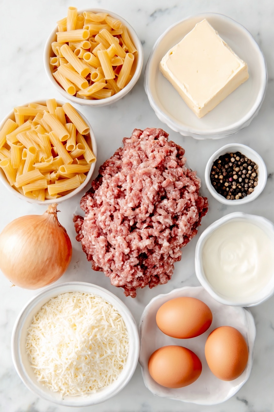 Creamy Ground Beef Pasta Recipe 7 Flat lay of unsalted butter pat, a pile of raw grass-fed ground beef, a large whole shallot with papery skin, dried rigatoni pasta, a small white bowl of chicken broth, a small white bowl of heavy whipping cream, shredded sharp white cheddar cheese mound, freshly grated parmesan cheese heap, whole brown eggs with clean shells, coarse kosher salt crystals, and whole black peppercorns arranged in simple white ceramic bowls and plates, balanced and symmetrical composition, placed on a clean white marble surface, soft natural light, photo taken with an iPhone, professional food photography style, fresh ingredients, white ceramic bowls, no bottles, no duplicates, no utensils, no packaging --ar 2:3 --v 7 --p m7354615311229779997 - Creamy Ground Beef Pasta, ground beef pasta recipes, easy creamy pasta dinner, one-pot ground beef pasta, cheesy beef pasta dish