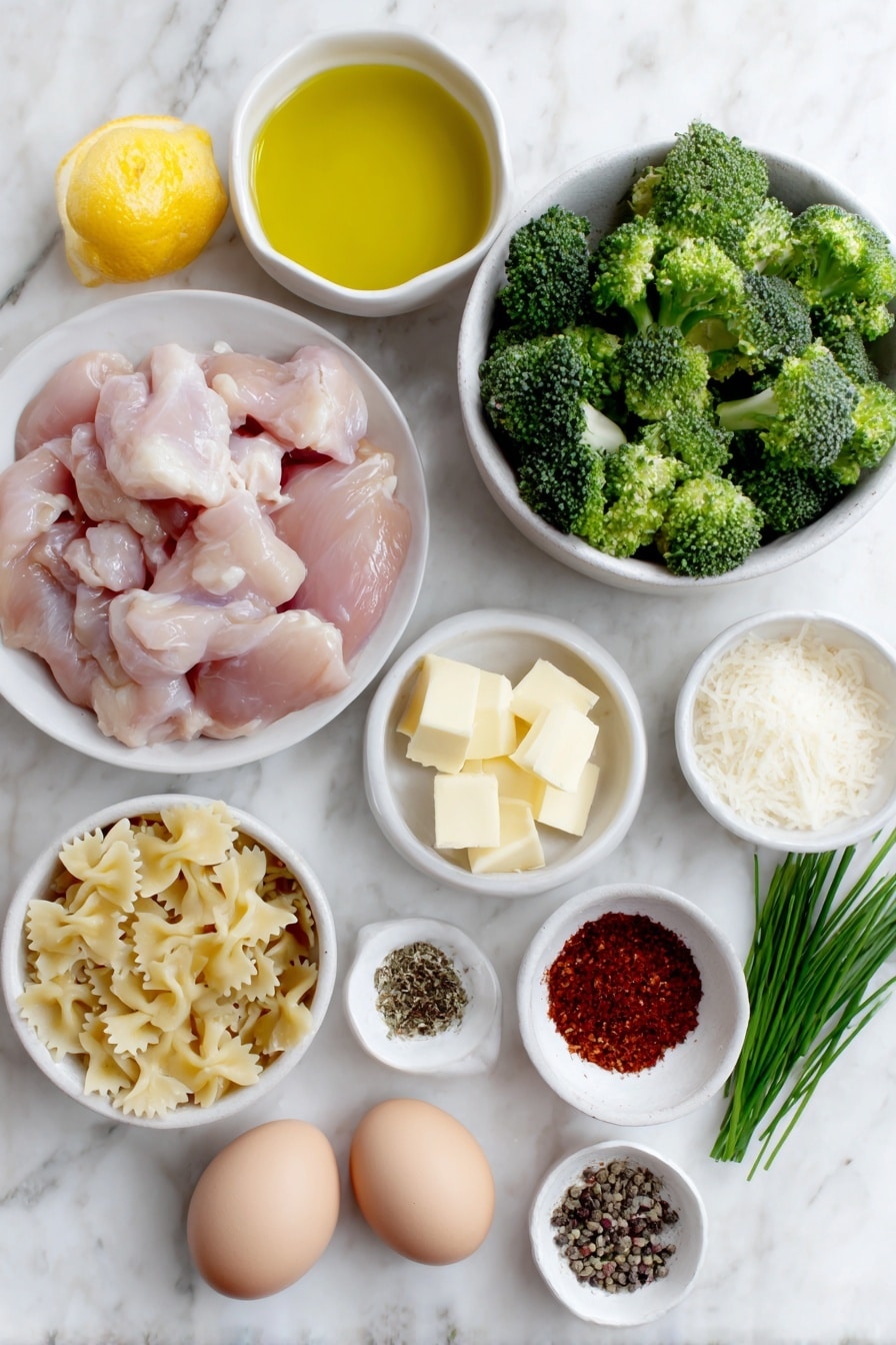 Lemon Chicken Pasta with Cowboy Butter Recipe 7 Flat lay of boneless skinless chicken breast pieces, uncooked with natural pink color, small pile of uncooked bowtie (farfalle) pasta, fresh bright green broccoli florets, small white ceramic bowl of golden olive oil, small white ceramic bowl of unsalted butter chunks, small white ceramic bowl of freshly grated Parmesan cheese, whole uncracked brown eggs, fresh lemon with half cut to show juicy interior, small white ceramic bowl of Dijon mustard, fresh green parsley sprigs, fresh green chives stalks, small white ceramic bowl containing coarse Cajun seasoning blend, small white ceramic bowl with garlic powder, small white ceramic bowl with smoked paprika, fresh cracked black peppercorns scattered neatly on the side, small white ceramic bowl with crushed red pepper flakes, salt crystals in small white ceramic bowl placed on a clean white marble surface, soft natural light, photo taken with an iPhone, professional food photography style, fresh ingredients, white ceramic bowls, no bottles, no duplicates, no utensils, no packaging --ar 2:3 --v 7 --p m7354615311229779997 - Lemon Chicken Pasta Cowboy Butter, Lemon Chicken Pasta with Cowboy Butter, Lemon Chicken Pasta recipe, easy lemon chicken pasta, creamy cowboy butter pasta