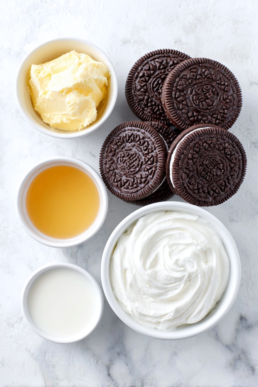 Oreo Ice Cream Sandwiches Recipe 7 Flat lay of whole Oreo cookies with their distinct black-and-white pattern, a small white bowl of melted golden butter, a small white bowl of thick white heavy cream, a small white bowl of glossy condensed milk, and a small white bowl containing clear vanilla extract, all arranged symmetrically with perfect proportions on a clean white marble surface, soft natural light, photo taken with an iPhone, professional food photography style, fresh ingredients, white ceramic bowls, no bottles, no duplicates, no utensils, no packaging --ar 2:3 --v 7 --p m7354615311229779997 - Oreo Ice Cream Sandwiches, Oreo dessert recipes, easy ice cream sandwiches, no bake Oreo treats, creamy ice cream sandwich ideas
